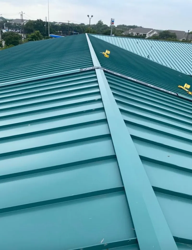 Green commercial metal roof ridge and valley for Metal Roof Repair in Rio Rancho
